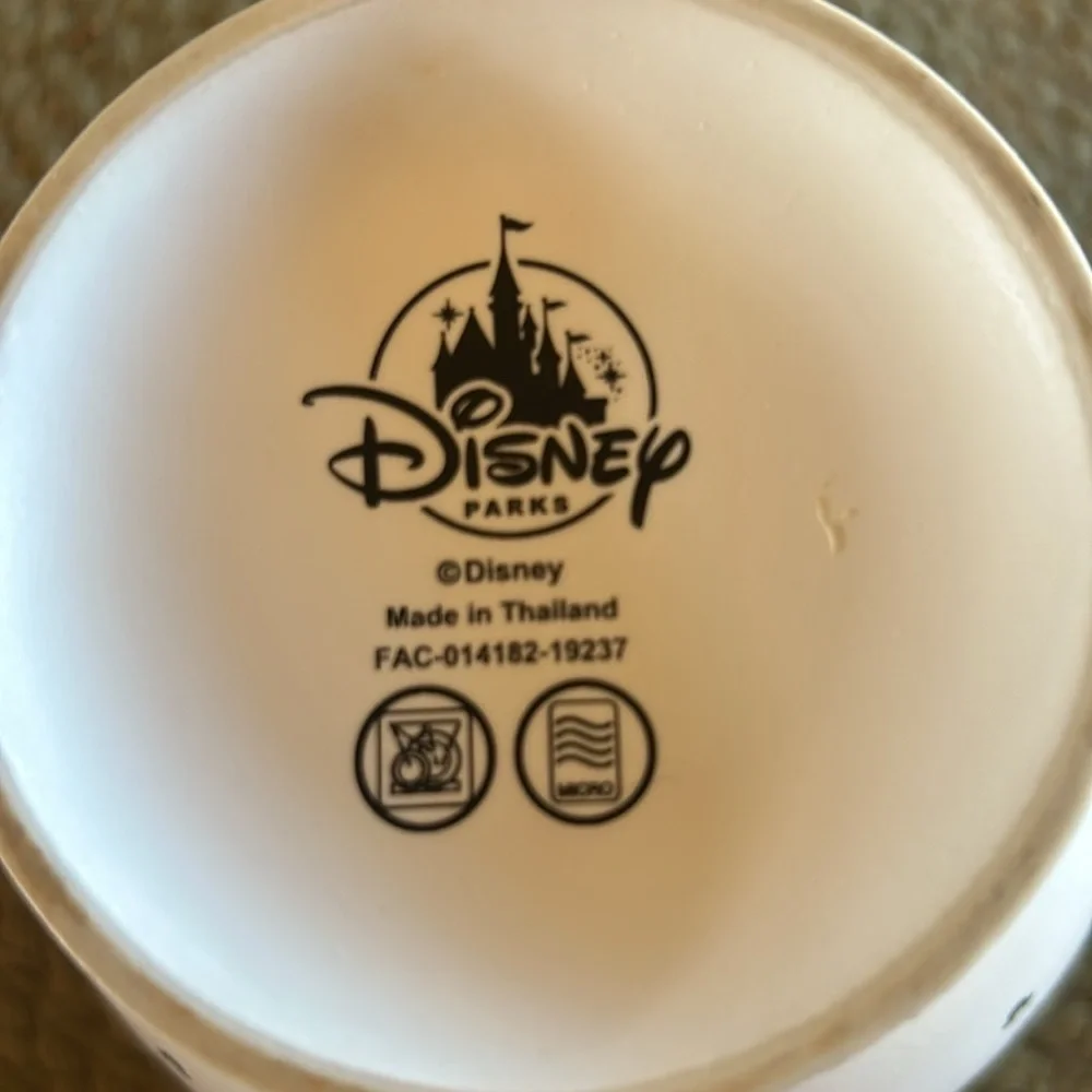 Disney cup or small soup bowl. White with black designs.